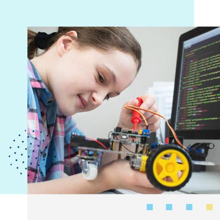 Image of a middle school student working with robotics